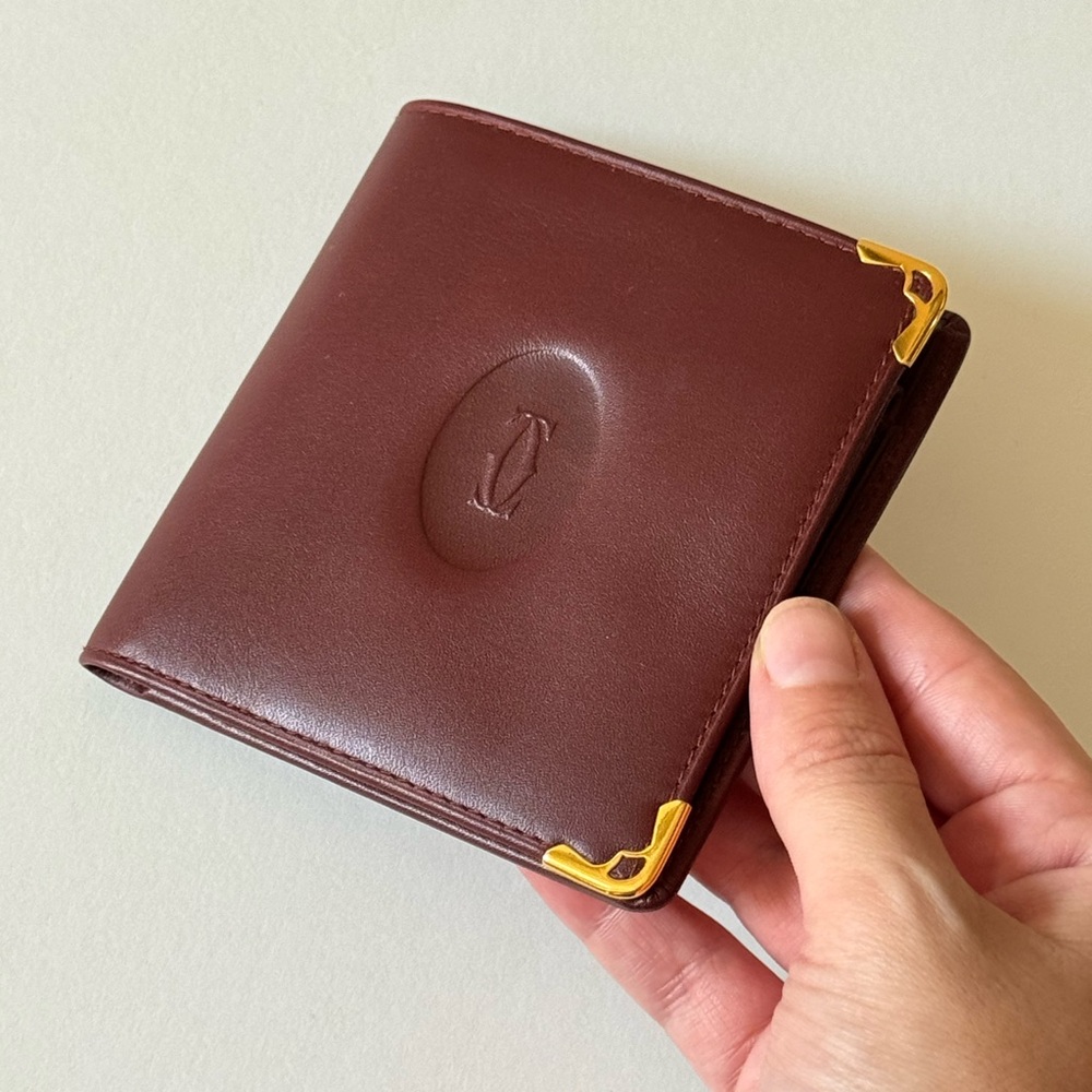 Cartier Embossed Bi-Fold Wallet in Burgundy Leather